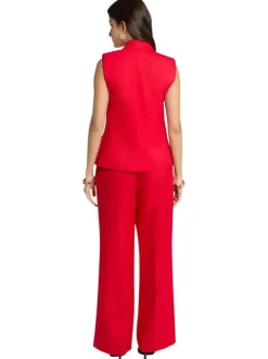 Pantalon rouge uni pourvu d'une coupe large et de détails plissés
