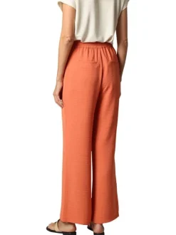 Pantalon rouille uni avec une coupe fluide et une taille élastiquée
