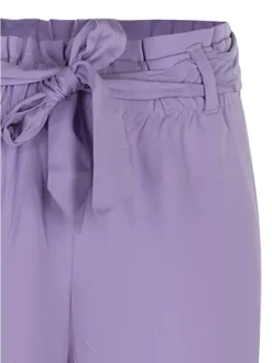 Pantalon uni à 2 poches avec une coupe paper bag et une taille haute