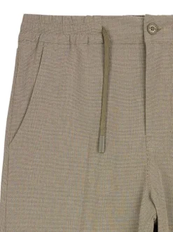 Pantalon vert à coupe droite pourvu d'une taille élastiquée plissée