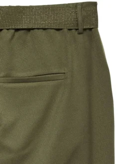 Pantalon vert pourvu d'une coupe droite et d'une taille élastiquée