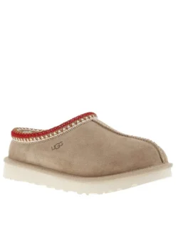 Pantoufles tasman en cuir beige avec logo iconique embossé sur le côté