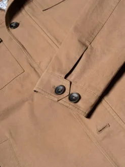 Parka en coton taupe unie avec une coupe droite et un col montant