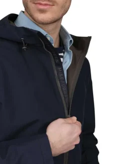 Parka marine uni avec une coupe droite et une fermeture zippée