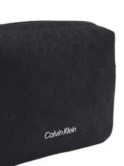 Petite sacoche rectangulaire noire avec un touché texturé et un imprimé all-over