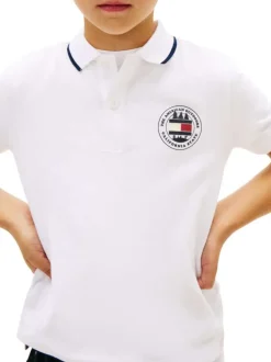 Polo en coton blanc à coupe droite pourvu d'un col à revers boutonné