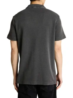 Polo anthracite uni pourvu d'une coupe droite et de manches courtes