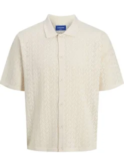 Polo beige à coupe droite pourvu d'un col à revers et de manches courtes