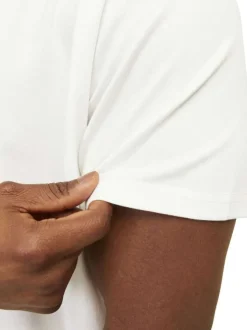 Polo blanc en maille piquée à coupe droite avec logo poitrine et manches courtes