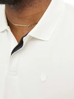 Polo blanc en maille piquée à coupe droite avec logo poitrine et manches courtes