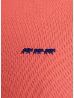 Polo corail en coton uni coupe droite à col boutonné et manches courtes