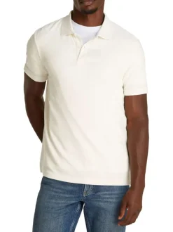 Polo écru uni en coton mélangé fermé par deux boutons avec une coupe ajustée