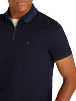 Polo en better coton initiative noir uni droit avec un col zippé