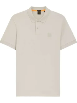 Polo en coton beige à coupe droite pourvu d'un col côtelé boutonné
