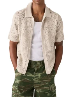 Polo en coton beige à coupe droite pourvu d'un col à revers côtelé