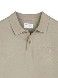 Polo en coton beige à coupe droite pourvu d'un col à revers texturé