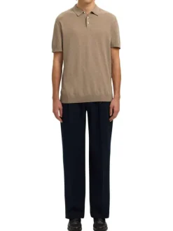 Polo en coton beige uni avec une coupe droite et un col boutonné