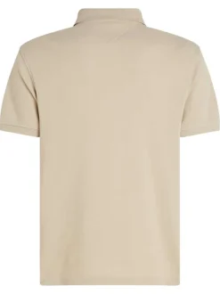 Polo en coton beige uni avec une coupe droite et un col polo