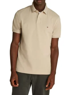 Polo en coton beige uni avec une coupe droite et un col polo