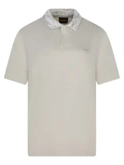 Polo en coton beige uni avec une coupe droite et un col à revers