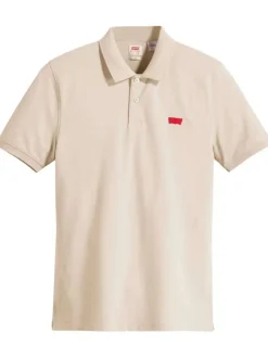 Polo en coton beige uni avec une coupe slim fit et patch cousu sur la poitrine