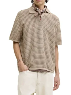 Polo en coton biologique beige à coupe droite pourvu d'un col à revers