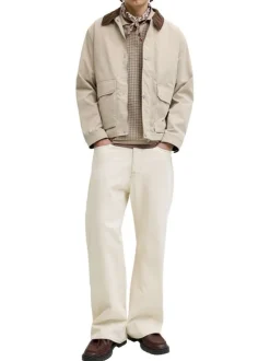 Polo en coton biologique beige à coupe droite pourvu d'un col à revers