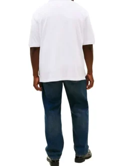 Polo en coton biologique blanc uni avec une coupe droite et un col boutonné