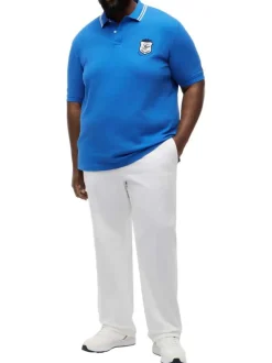 Polo en coton biologique bleu uni pourvu d'un col boutonné et de manches courtes