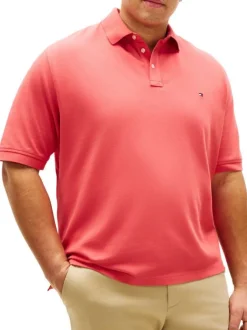 Polo en coton biologique corail uni avec une coupe droite et un col boutonné
