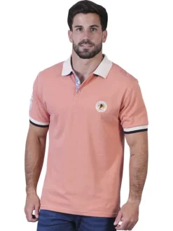 Polo en coton biologique corail uni pourvu d'un col boutonné
