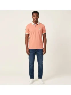 Polo en coton biologique corail uni pourvu d'un col boutonné