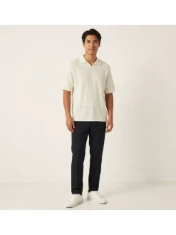 Polo en coton biologique écru à coupe droite pourvu d'un col à revers