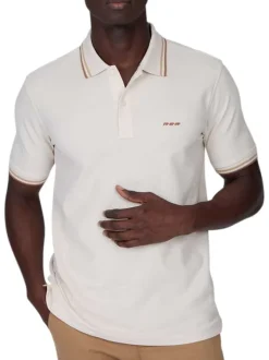 Polo en coton biologique écru uni avec une coupe droite et un col boutonné