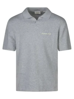 Polo en coton biologique gris uni avec une coupe droite et un col à revers