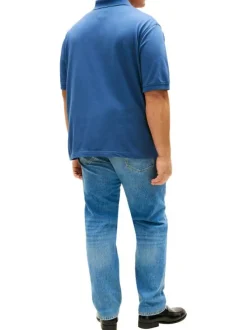 Polo en coton biologique indigo uni avec une coupe droite et un col boutonné