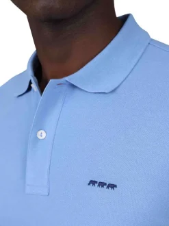 Polo en coton biologique lavande uni avec une coupe droite et un col à revers