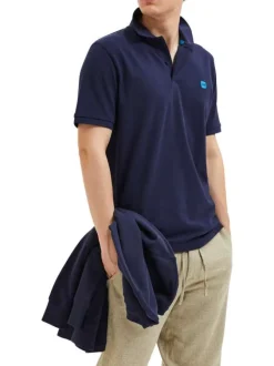 Polo en coton biologique maille piquée marine à coupe droite et col boutonné