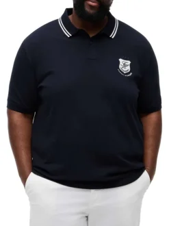 Polo en coton biologique marine uni pourvu d'un col boutonné