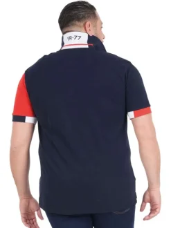 Polo en coton biologique marine uni pourvu d'un col boutonné