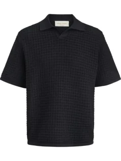 Polo en coton biologique noir à coupe droite pourvu d'un col à revers