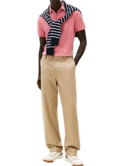 Polo en coton biologique rose à coupe ajustée pourvu d'un col boutonné