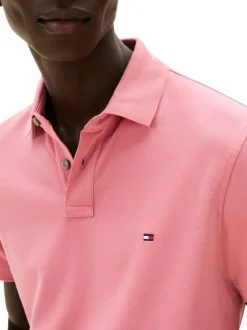 Polo en coton biologique rose à coupe ajustée pourvu d'un col boutonné