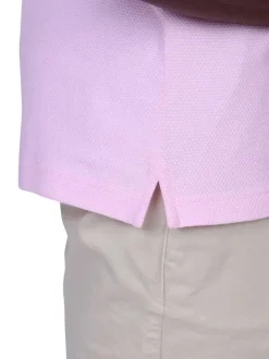 Polo en coton biologique rose à coupe droite pourvu d'un col boutonné
