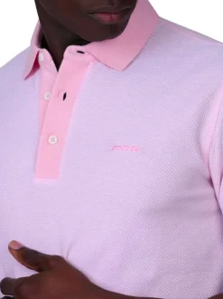 Polo en coton biologique rose à coupe droite pourvu d'un col boutonné