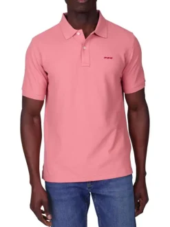 Polo en coton biologique rose uni avec une coupe droite et un col boutonné