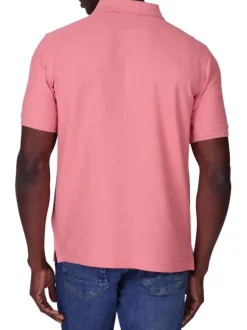Polo en coton biologique rose uni avec une coupe droite et un col boutonné