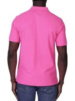 Polo en coton biologique rose uni avec une coupe droite et un col à revers
