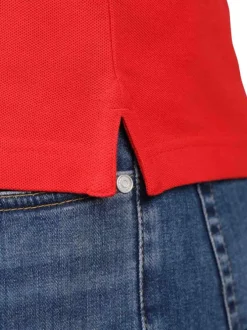 Polo en coton biologique rouge uni avec une coupe droite et un col à revers
