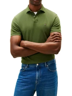 Polo en coton biologique vert à coupe ajustée pourvu d'un col boutonné